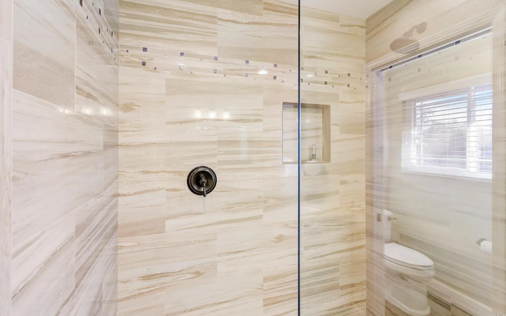 Slab walls vs Tile walls in a shower - DC Tile and Stone