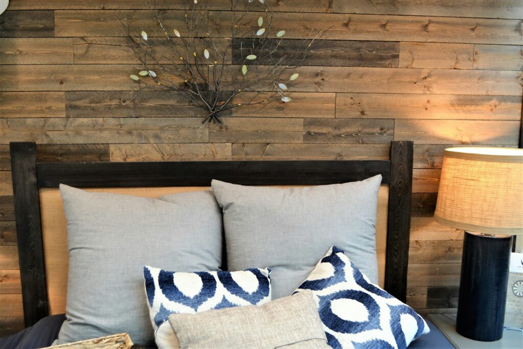 Bedroom vibe with a reclaimed wood wall