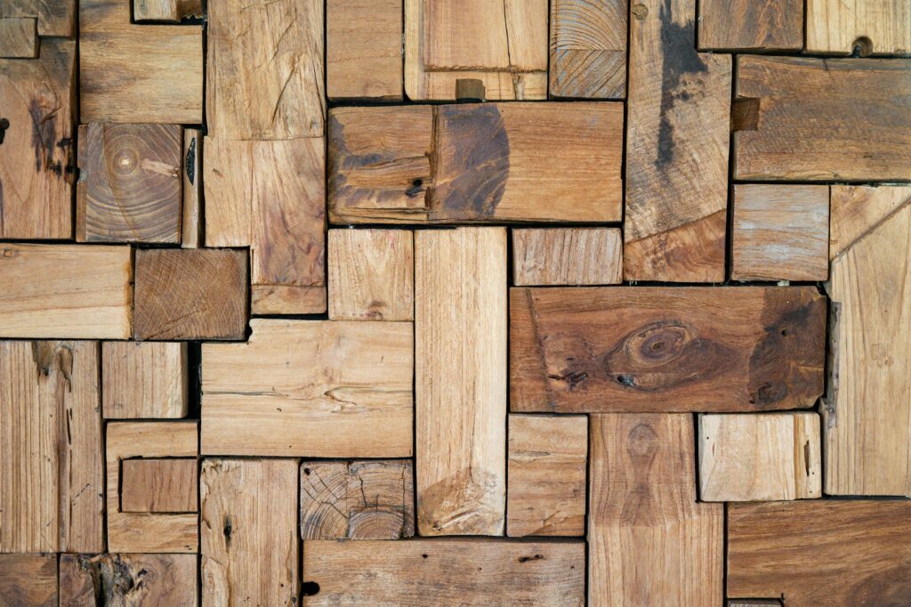 Geometric pattern wall covering crafted from reclaimed wood