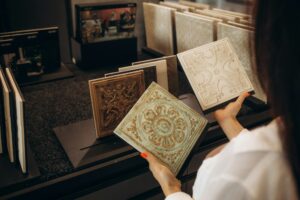 Middle age couple choosing new ceramic tiles for their home bathroom