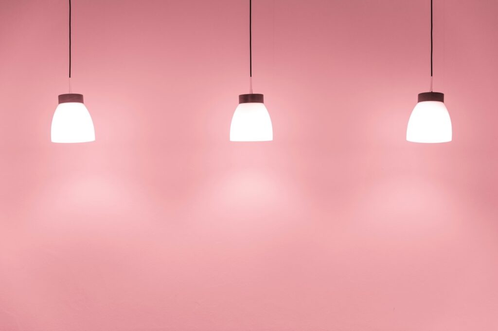 ceiling drop down light decoration on sweet pink wall for interior lighting background