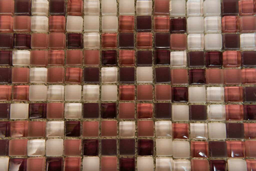 background of multicolored glass tiles, top view