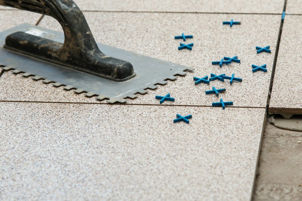 Installation of floor tiles